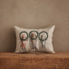 The Christmas Wreath Trio Pocket Pillow is a decorative beige pillow with embroidered woodland friends—a fox, bear, and rabbit—holding green wreaths, perfect for adding holiday charm to your rustic decor.