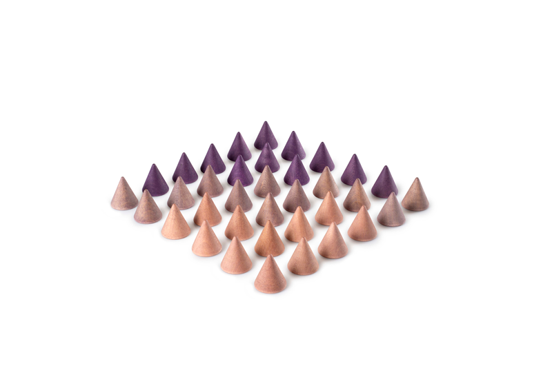 Grapat Mandala Peak: Small cone-shaped incense sticks, arranged in five neat rows—dark purple cones at the center, lighter brown ones around them—reminiscent of Grapat toys, displayed on a white background.