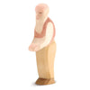 A handcrafted wooden figurine of an elderly man with a bald head and a white beard, wearing a brown vest and tan pants. Made from maple, the Ostheimer Grandfather stands upright with arms bent slightly forward, showcasing a minimalist, artisanal design.