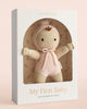 The Cuddle + Kind My First Baby (Blush), hand-knit from natural cotton yarn and dressed in pink, comes in a white box and provides 10 meals to children with every purchase. Ships in one week.
