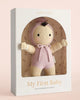 Cuddle + Kind My First Baby (Lavender) ships in one week—each hand-knit doll in a lavender outfit and bonnet comes in a white floral-lined box. Made from natural cotton yarn, every purchase feeds 10 children.