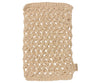 A rectangular, beige, hand-knitted washcloth made of thick, textured yarn with a small branded tag—perfect for use with your Maileg Bathroom Set or as part of your Maileg Wellness Accessories.