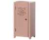 The Maileg Miniature Closet is a small, light pink wooden cabinet made from FSC-certified wood, featuring a single door with floral engraving, round knob, and sturdy legs.