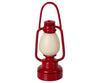 The Maileg Family Room Set includes a charming red lantern with a rounded base, cream center, and arched handle—perfect for lighting up your Maileg mice adventures.