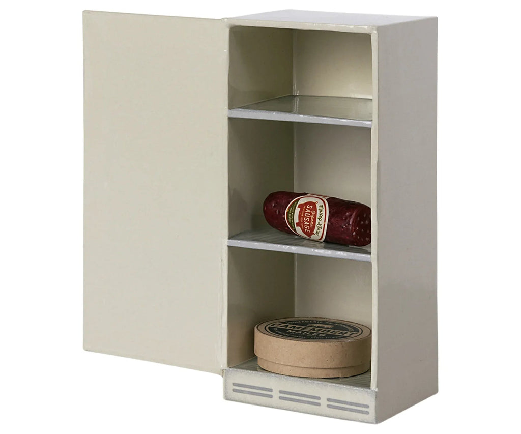 A Maileg Chef's Kitchen Starter Set with an off-white finish, featuring two shelves. The top shelf holds a small red jar, and the bottom shelf has a round tin container designed for pretend play kitchen.