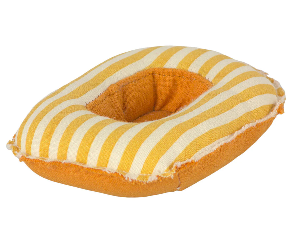 A Maileg Beach Raft, Small Mouse - Yellow Stripe stuffed toy resembling a donut. The toy has an orange bottom and appears to be slightly worn, with visible seams and frayed edges, giving it a raft look.