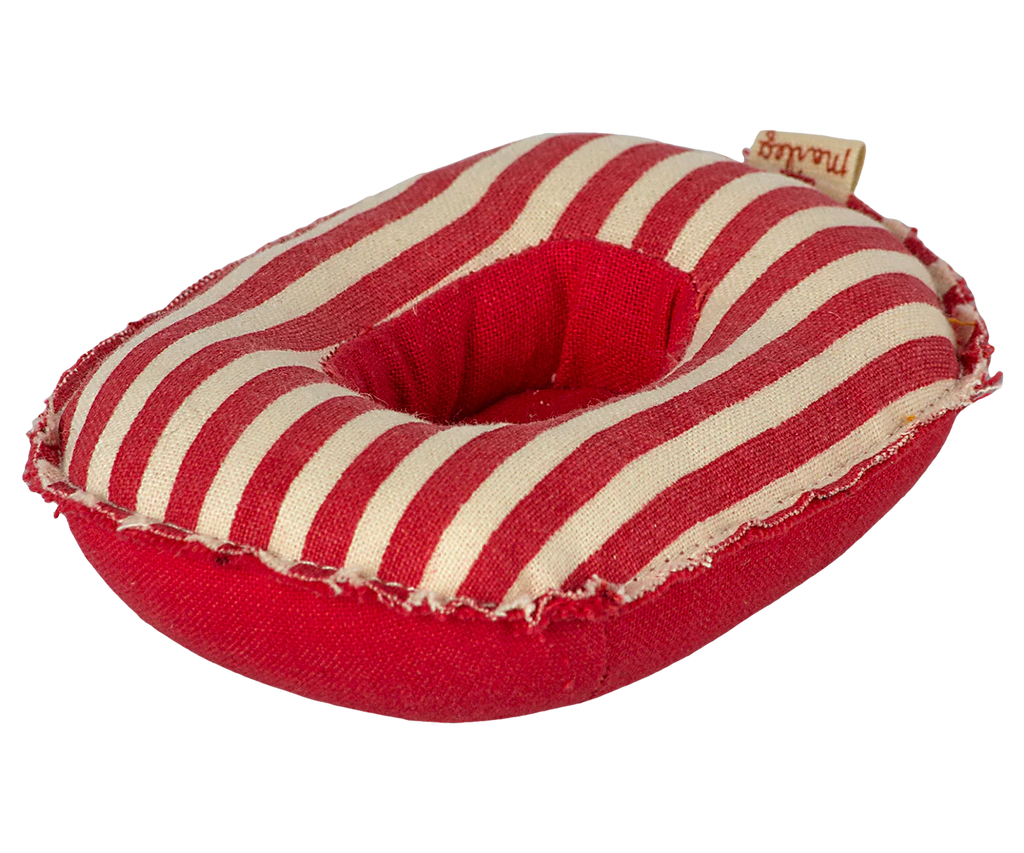 The Maileg Rubber Boat, Small Mouse - Red Stripe is a red and beige striped donut-shaped fabric cushion with a central hole and frayed edges, designed as an accessory for Maileg mouse toys, shown on a plain white background.