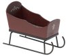 The Maileg Sleigh, Mouse - Red is a small wooden sleigh with hand-painted red details and black curved metal runners.