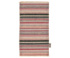 A Maileg Rug - Striped with horizontal stripes in various shades of green, red, beige, and white, with a visible fabric label on the bottom right corner.