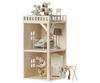 A Maileg Farmhouse - Annex Bonus Room wooden dollhouse with two levels and an open design, featuring miniature furniture and mouse figures engaged in domestic activities.