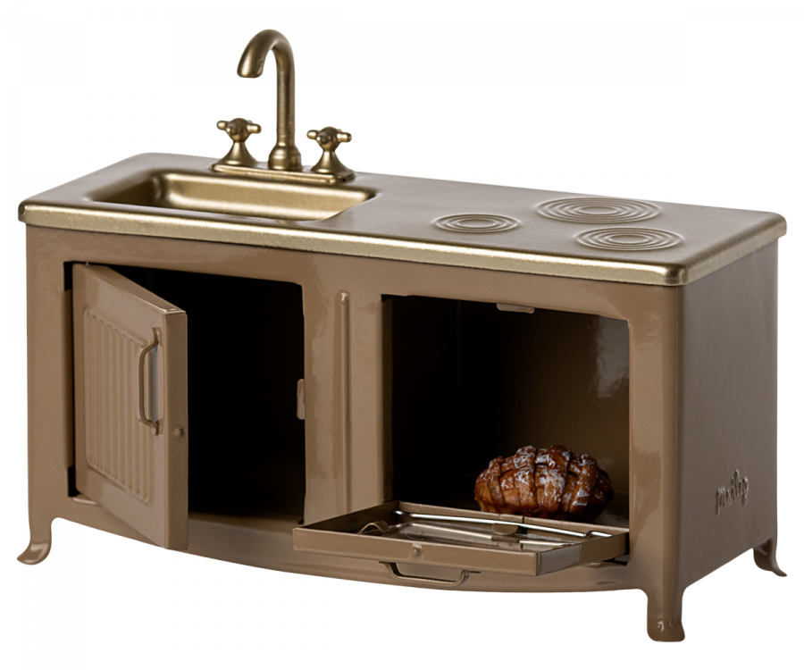 A Maileg Kitchen - Light Brown featuring a stovetop, sink, and an open oven door with a roast chicken inside, set against a transparent background.