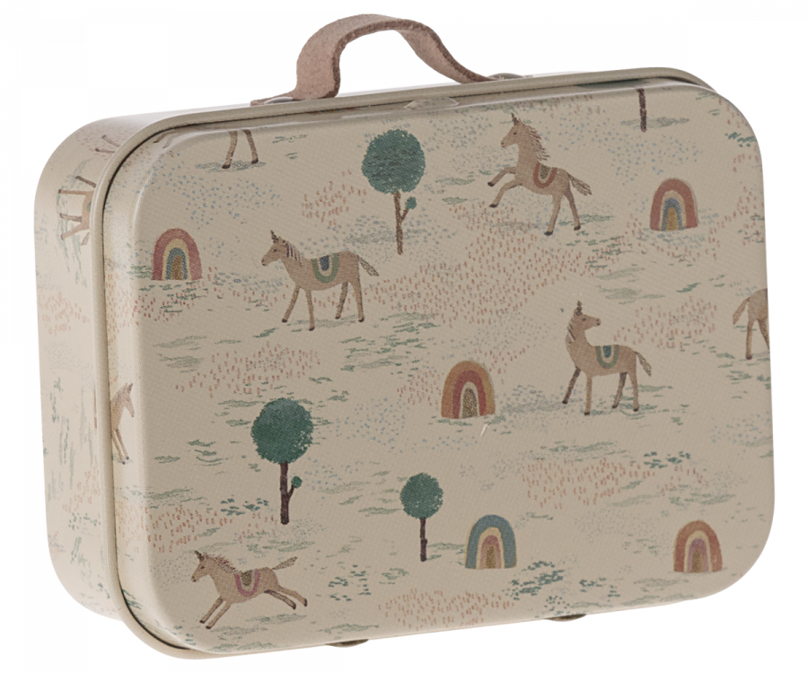 The Maileg Suitcase, Micro is a charming small metal suitcase adorned with whimsical, colorful illustrations of brown horses, green trees, and vibrant rainbows. It is perfect for storing small items and features a beige handle on top for easy carrying.