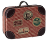 The Maileg Suitcase, Micro is a small metal case with a vintage red pattern, dark brown leather corners, and travel stickers—ideal for storing small items or as a charming gift presentation.