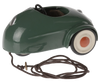 A vintage green toy car with white wheels and a brown pull string—ideal for the Maileg Camping Set with Brother and Sister or as a charming touch to your SuitCasa house accessories.