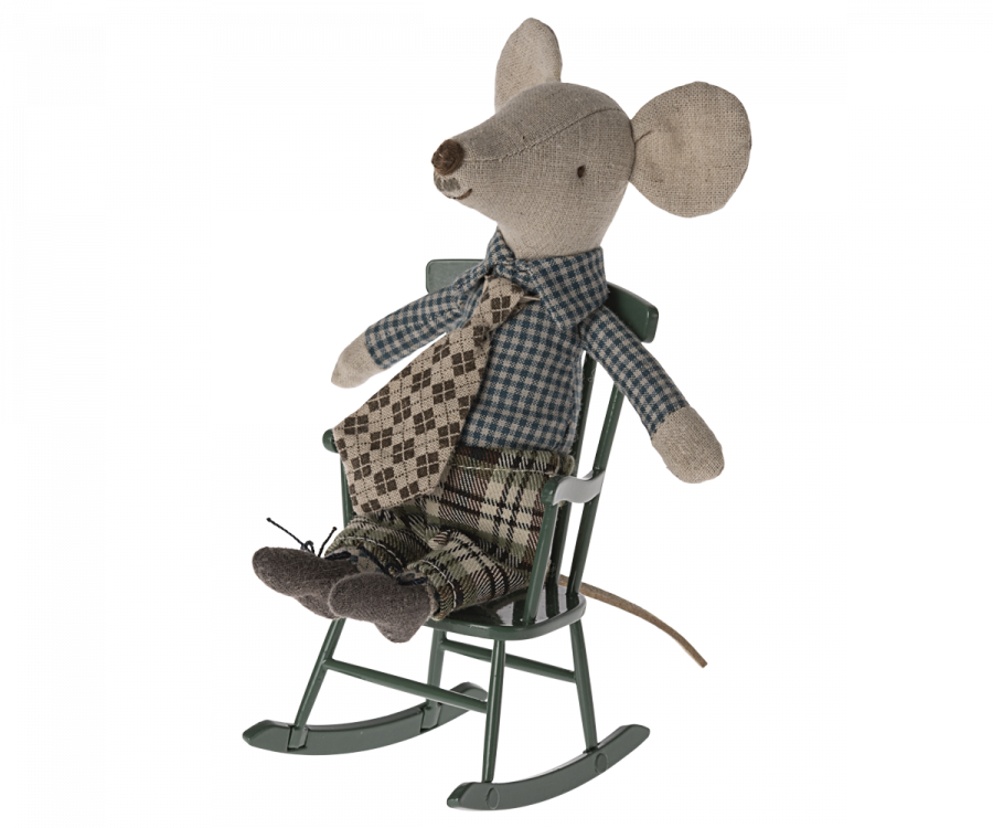 A plush mouse toy dressed in a checkered vest and pants, sitting on a Maileg Rocking Chair - Dark Green designed as mouse furniture, isolated on a black background.