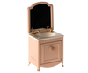The Maileg Bathroom Set features a pink vanity with gold faucet, white sink, mirror, and cabinet—ideal for creating a charming spa scene in your dollhouse when paired with Maileg Wellness Accessories.