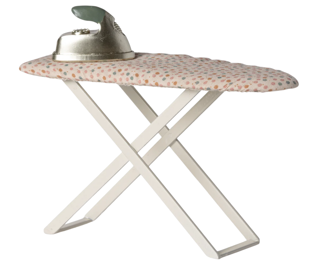 The Maileg Ironing - Mouse Size features a vintage-style silver iron on a mini ironing board with a white frame and polka dot cover in vibrant orange, red, and blue colors against a plain backdrop, ready for its mouse family.