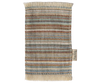 A rectangular woven fabric swatch with fringed edges showcases horizontal stripes in brown, blue, yellow, beige, and white. Perfect for dollhouse decor or enhancing your Maileg Fully Furnished Suitcasa. Includes a right-side fabric tag.