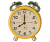 A vintage-style yellow Maileg Alarm Clock for dollhouses features twin bells, a white face with black numerals and hands showing 10:10, "REPEAT" and "ALARM" dials. Suitable for ages 3+. Ships in approx. one week.