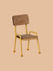 The Maileg Mouse Size School Chair - Yellow, featuring a wooden seat and backrest with hand-painted details, is set against a plain beige background, showcasing its charming yellow metal legs and armrests. Ships in approximately one week.