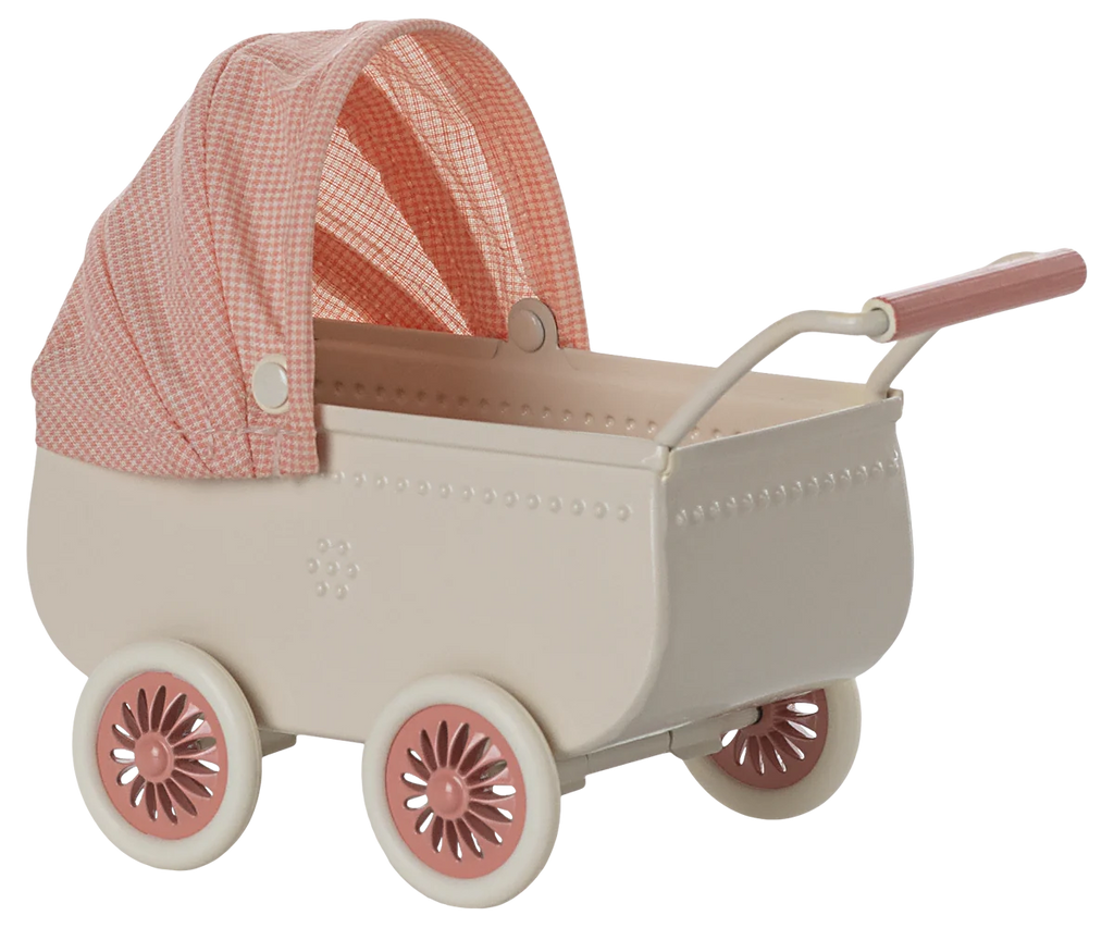 The Maileg Pram, Mouse - Coral is a vintage-style toy baby carriage featuring a coral and white checkered canopy, coral wheels, a coral handle, and a soft mattress against a plain background.