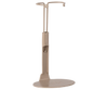 The Maileg Mouse Stand, Medium - Sand is a beige metal stand with a flat oval base and upright support ending in a circular hook, perfect for displaying your collection of headphones or similar items.