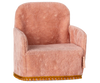 The Maileg Soft Chair - Rose is a charming, small plush pink armchair with a rounded backrest and soft upholstery, ideal for any Mouse hole Farmhouse or Maileg collection. It features gold fringe detailing and is perfect for decorative or toy use. Pre-order now to ship in late February.