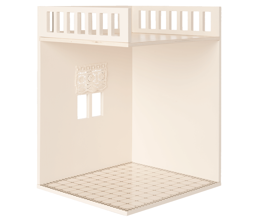 The Maileg Bonus Room Bathroom Set features a cream-colored dollhouse room with a checkered floor, window with lace curtain, and an open loft area—ideal for displaying your favorite miniature accessories.