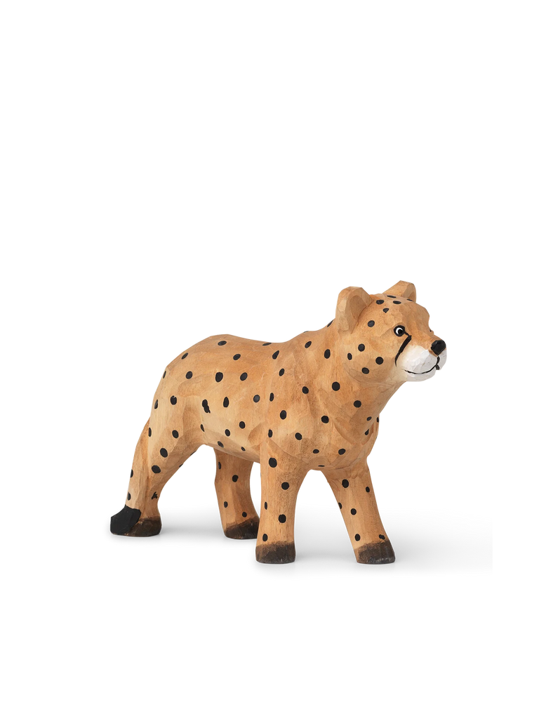 A Hand Carved Wooden Cheetah, finely hand-carved with visible wood grain and black spots, stands in profile against a solid white background with motion blur lines indicating speed. Perfect for kids'