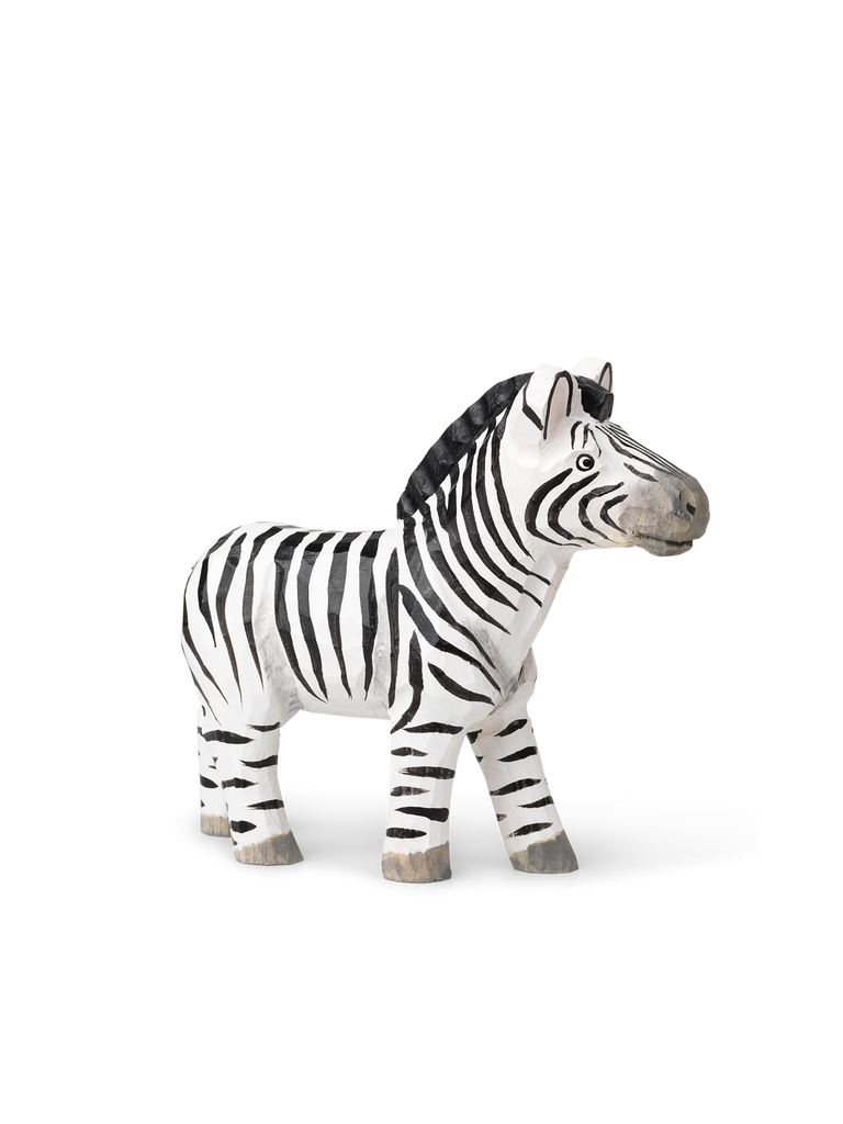 A Hand Carved Wooden Zebra sculpture, hand-carved in a realistic style, stands against a transparent background with a shadow under its feet. The zebra features distinctive black and white stripes.