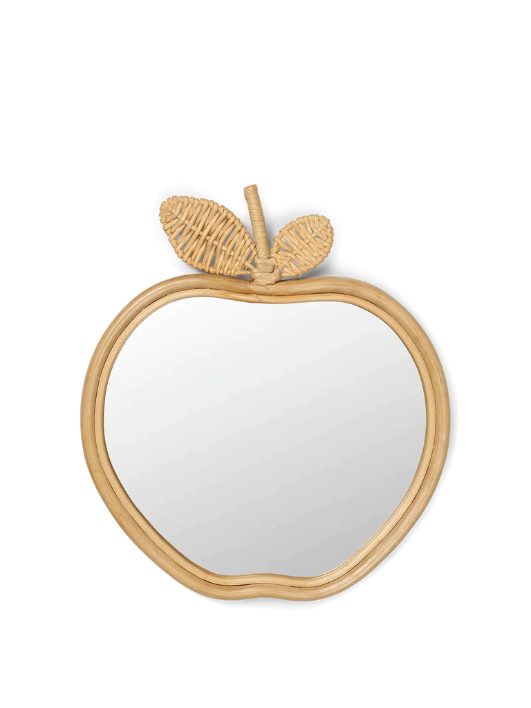 An Ferm Living Apple Mirror with a rattan frame and a bamboo leaf and stem design, set against a black background.