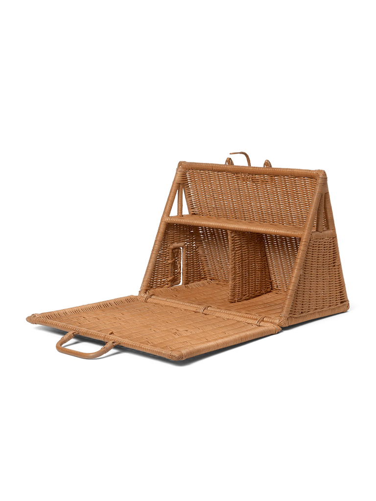 A braided A-Frame Dollhouse crafted into the shape of a detailed archetype A-house, featuring a triangular roof and extended front porch, set against a black background.