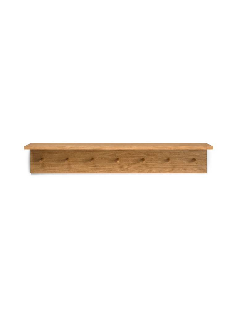 A Ferm Living Large Place Rack - Oak crafted from oiled oak veneer with five visible screws, centered and isolated against a black background.