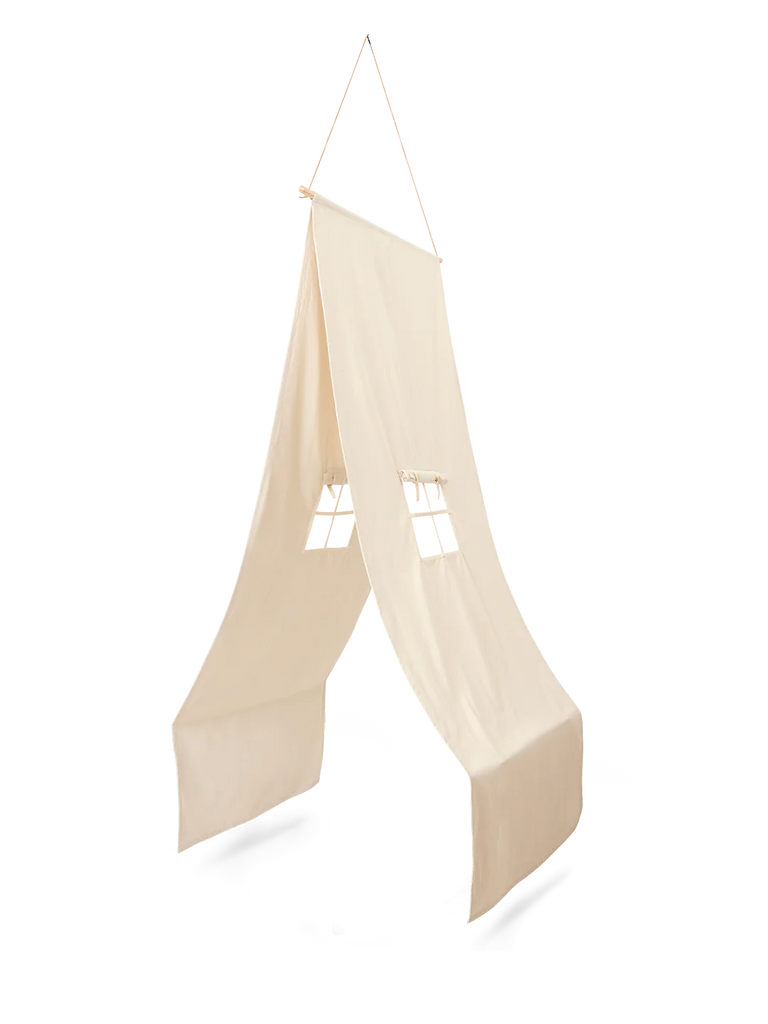 A Ferm Living Settle Bed Canopy - Off-White, draped fabric hanging from the ceiling with a triangular top, featuring peeping white decorative lights, made from GOTS certified organic cotton, set against a black background with horizontal lines