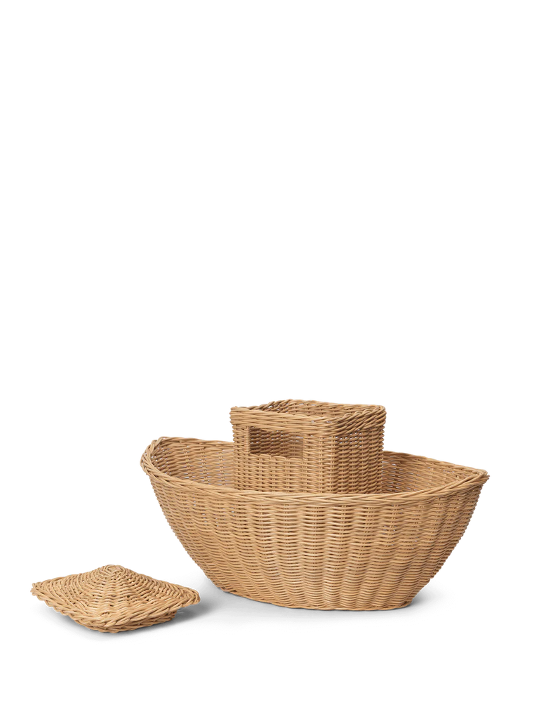 Three stacked Braided Arks of various sizes with a solitary small square basket beside them, all set against a black background.