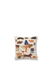 A handmade appliqué cushion with a minimalist, hand-embroidered design featuring abstract shapes, a dog, houses, trees, and a cart in various earthy tones such as brown, orange, blue, and beige. The light-colored background enhances the intricate details of this Ferm Living Village Cushion - Off-White GOTS certified organic cotton piece.