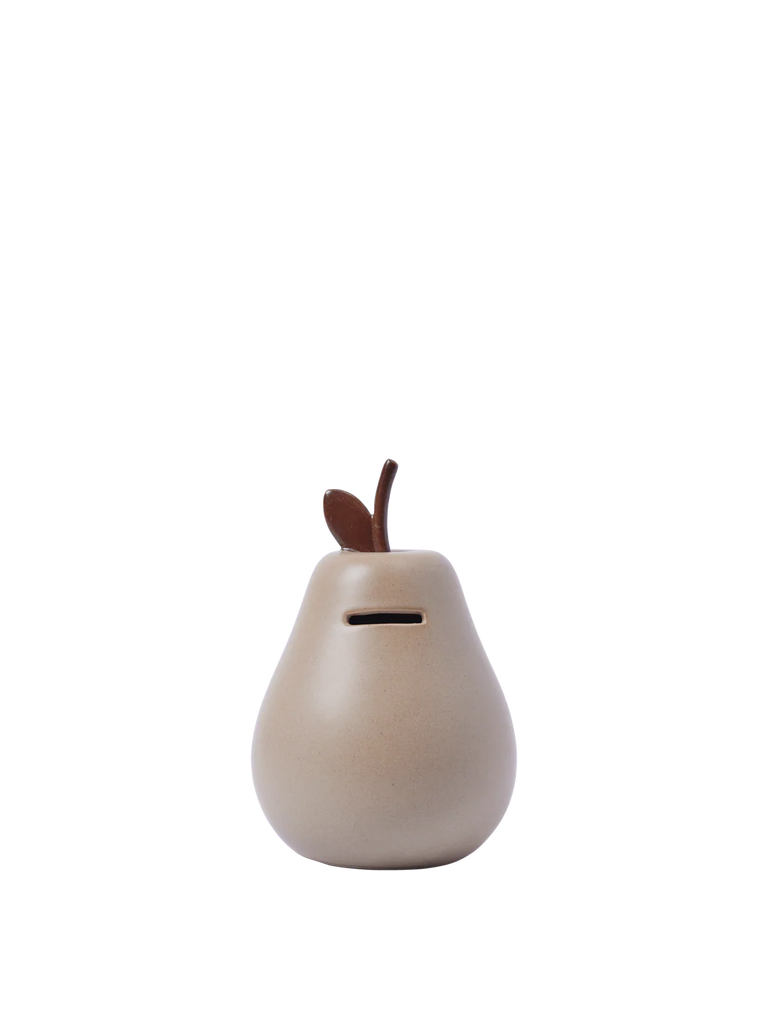 The Ferm Living Pear Money Bank is a ceramic, pear-shaped coin bank with a leaf and stem detail, ideal for kids' room decor. Features a front coin slot and comes in a minimalist design set against a white background.