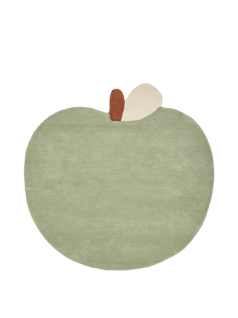 The Ferm Living Apple Tufted Rug - Tea Green is a hand-tufted New Zealand wool rug shaped like a green apple with a brown stem and beige leaf, perfect for your kids’ playroom.