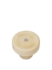 A round, oat-hued ribbed object with a metallic center—resembling the base of the Ferm Living Ripple Portable Lamp - Oat—rests on a plain white background.