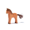 The Ostheimer Brown Colt is a handcrafted wooden horse figurine with a brown mane and textured tail, standing on all fours. Made in the classic Ostheimer style, it features lifelike detail and sustainable craftsmanship against a white background.