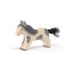 The Ostheimer Pony - Running is a handcrafted wooden toy horse with gray and beige markings, a black mane, and a black tail—perfect for fans of sustainable Ostheimer toys.