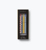 The Schoolhouse Gel Pen Set of 4 by Rifle Paper Co. includes four retractable gel pens, each adorned with vibrant floral and striped patterns, packaged in a sleek black box with a clear window. Featuring 0.5 mm rollerball tips and bright ink, these pens ensure smooth and vivid writing.