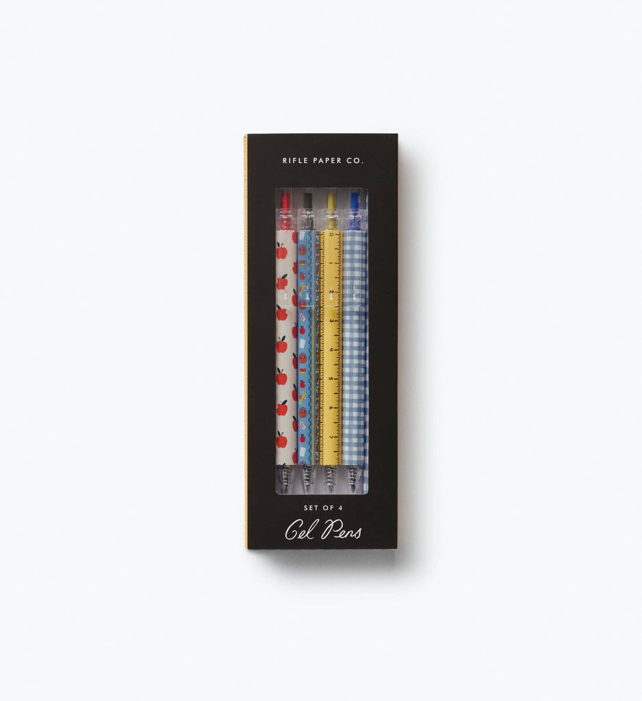 The Schoolhouse Gel Pen Set of 4 by Rifle Paper Co. includes four retractable gel pens, each adorned with vibrant floral and striped patterns, packaged in a sleek black box with a clear window. Featuring 0.5 mm rollerball tips and bright ink, these pens ensure smooth and vivid writing.