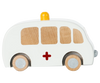 The Maileg Wooden Ambulance boasts a white body with natural wood window accents, a red cross on the side, gray wheels, and is made from solid wood. It features a yellow light on top and a pull-back function for endless play.