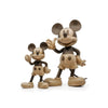 Two Boyhood - Disney x Mickey Mouse, Small figurines in different sizes, both standing and giving a thumbs-up gesture.