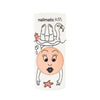 A bottle of Nailmatic Flamingo kids washable nail polish featuring a cartoon face with large eyes and puckered lips. The cap is whimsically adorned with a drawn bath and playful doodles like bubbles and a.