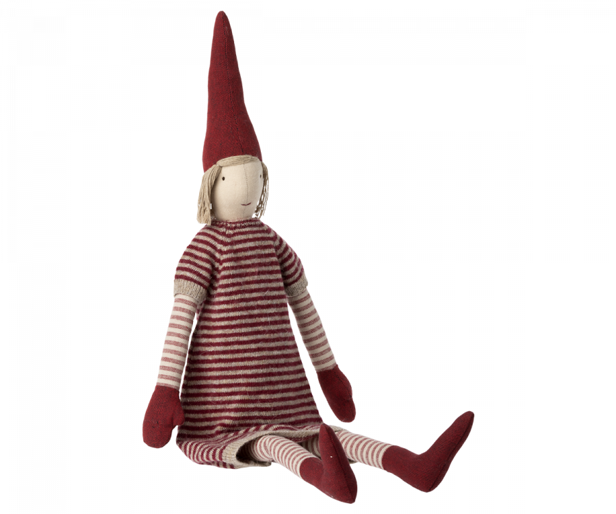 The Maileg Christmas Maxi Pixy is a delightful plush doll ideal for holiday decor, featuring a red pointed hat and a red-and-white striped dress. It sits upright with matching striped legs, solid red mittens, beige fabric for the head and feet, and has blond yarn hair crafted from exclusive materials.