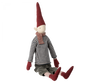 Introducing the Maileg Christmas Maxi Pixy, made from exclusive materials. This charming plush doll features a tall red pointed hat, a red scarf, a striped long-sleeve shirt, red mittens, gray pants, and striped socks. It sits with its legs extended forward and makes a delightful Christmas decoration.