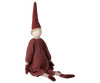 A Maileg Christmas Mega Pixy - (Size 6) with striped legs and arms, wearing a red pointed hat and an exclusive materials red striped dress, sitting against a white background.