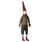 A Maileg Christmas Mega Pixy - (Size 6) with a red pointed hat, white face, brown sweater, grey pants, and striped socks, standing isolated against a plain background as a Christmas decoration.
